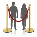 2 Gold Stanchions with Red Velvet Rope Barrier