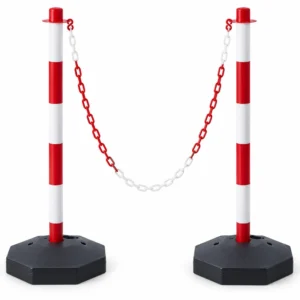 Pair of red and white pedestrian flow posts with connecting chain and weighted bases
